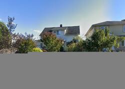  E John St